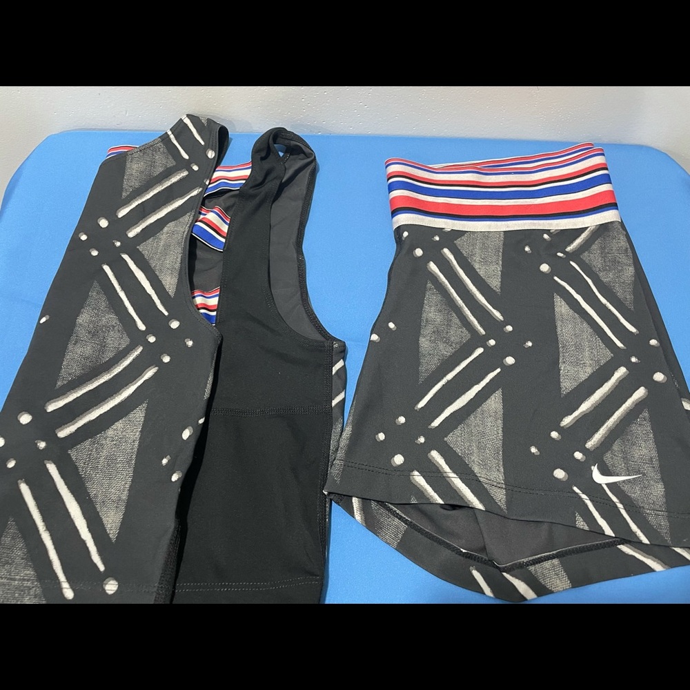 Nike running top and shorts set. Lightly used. Maybe wore it two or three times.